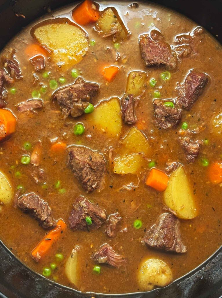 A closeup of the beef stew with big chunks of meat, potatoes, and carrots