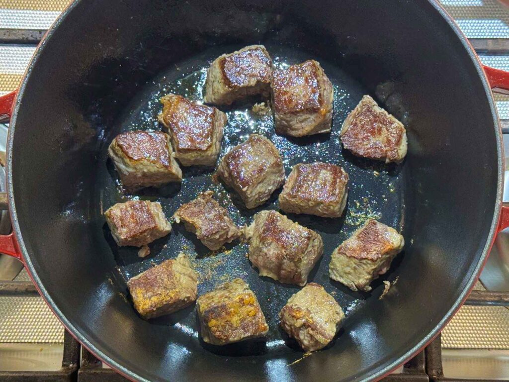 Browning chunks of meat for the beef stew