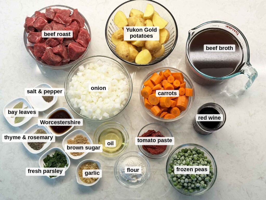Ingredients for beef stew in bowls