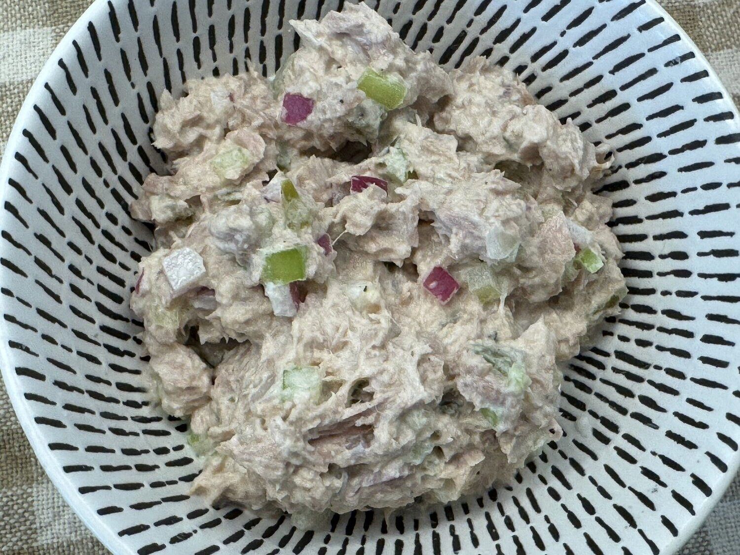 Finished creamy tuna salad in a white bowl