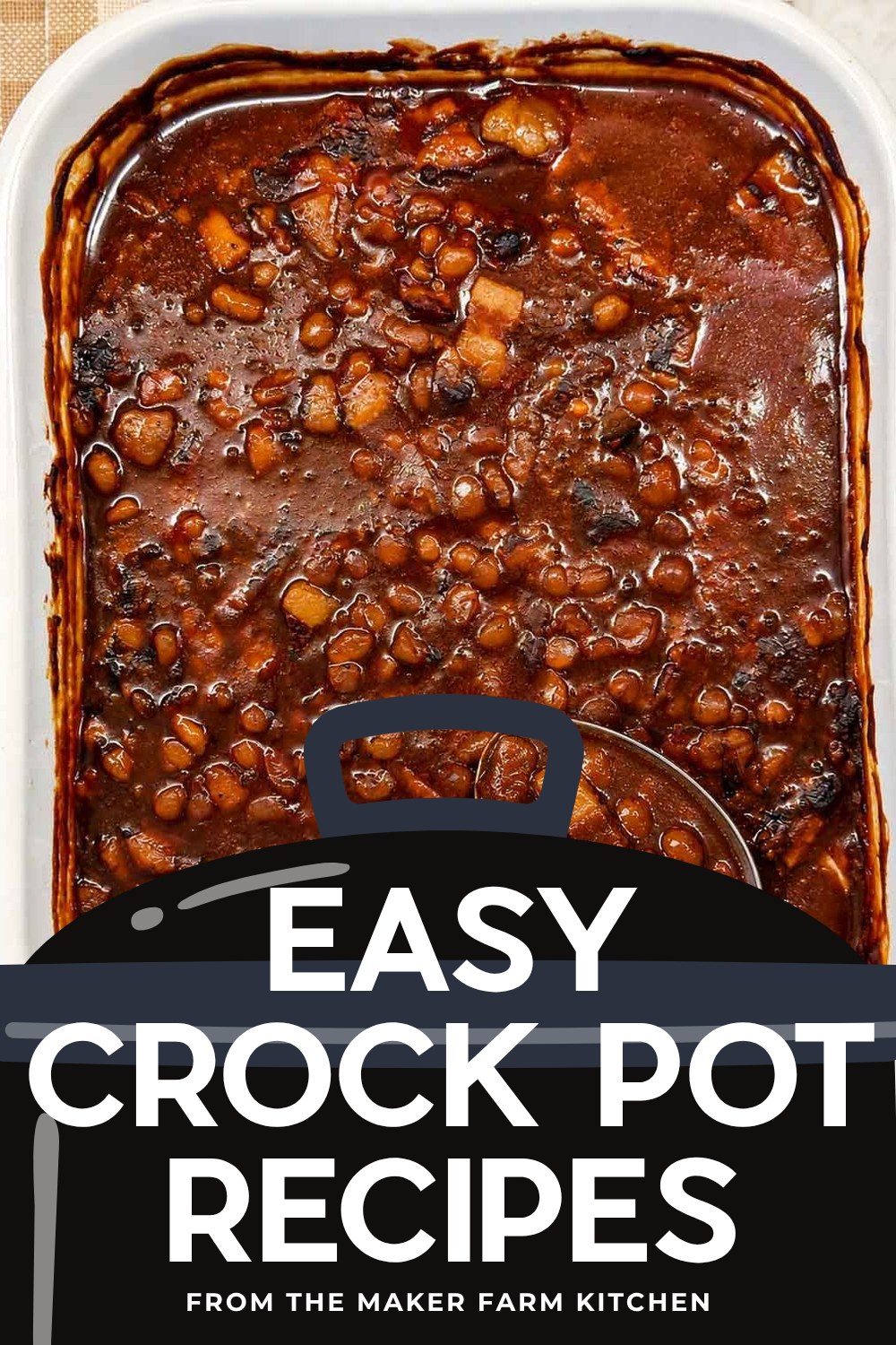 Homemade baked beans with bacon in a casserole dish