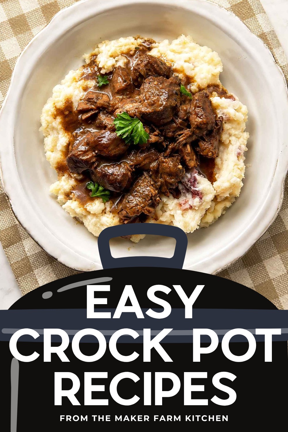 Beef tips and brown gravy over mashed potatoes in a bowl