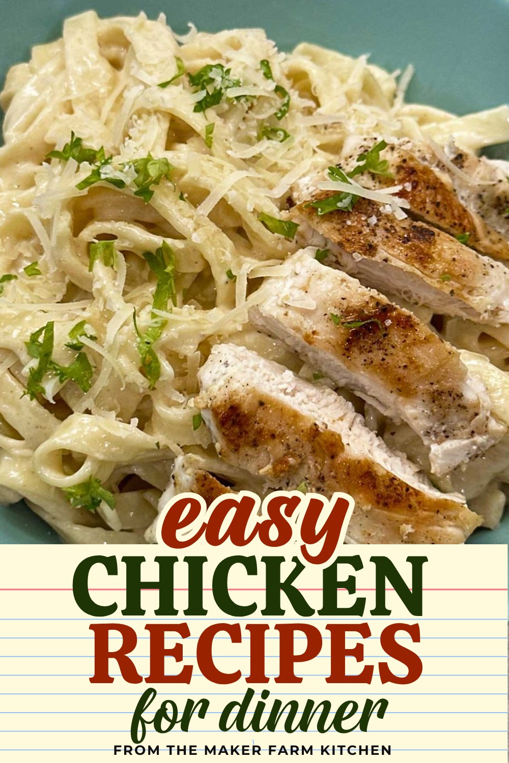 Chicken alfredo with sliced seared chicken over creamy fettuccine in a blue bowl