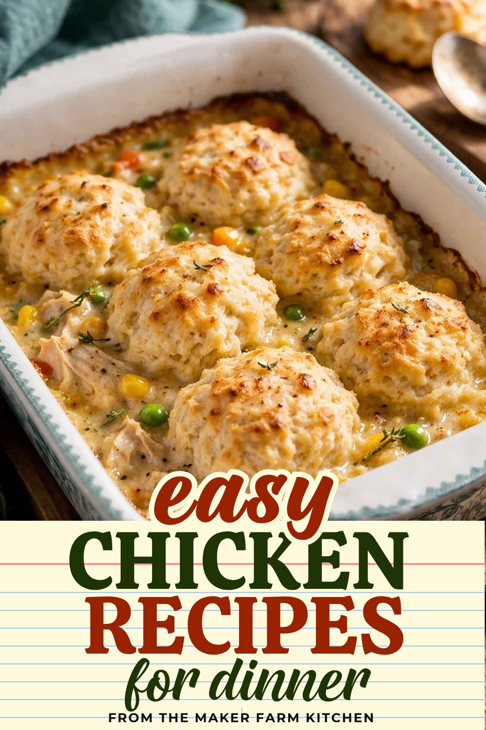 Chicken and biscuit casserole with golden biscuit topping in a white casserole dish