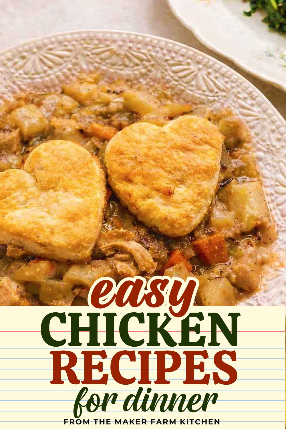 Chicken pot pie casserole with a drop biscuit topping served in a bowl