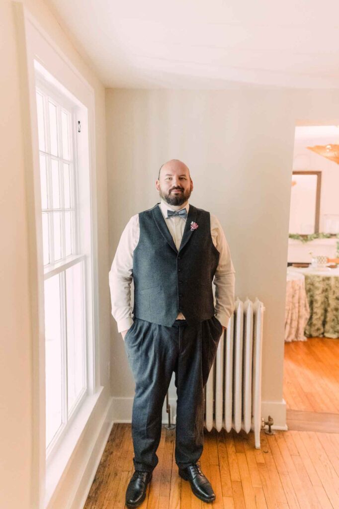 Greg Reese dressed for his wedding in the farmhouse