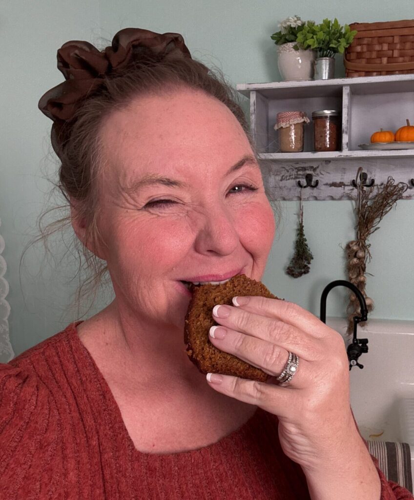 Jennifer eating a slice of pumpkin bread on Maker Farm