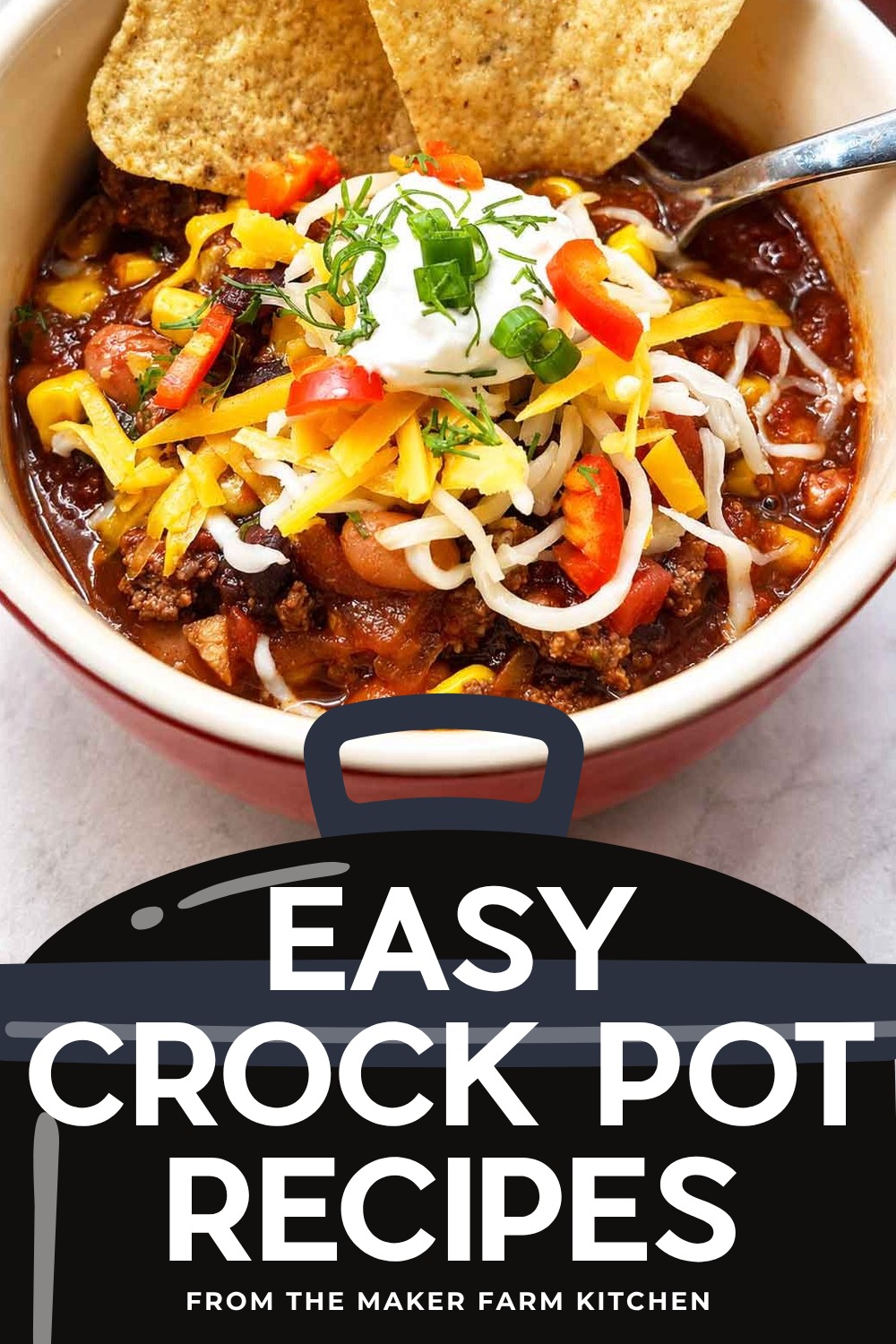 A bowl of taco soup topped with cheese and tortilla chips