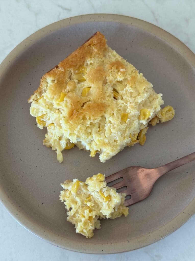 Real everyday photo of a plate of corn casserole
