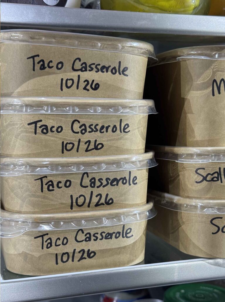 Labelled leftover containers in the refrigerator