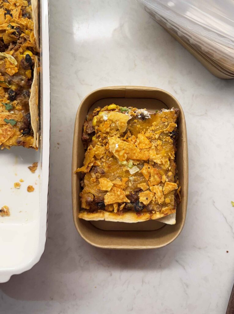 Leftover taco casserole in a small individual serving container