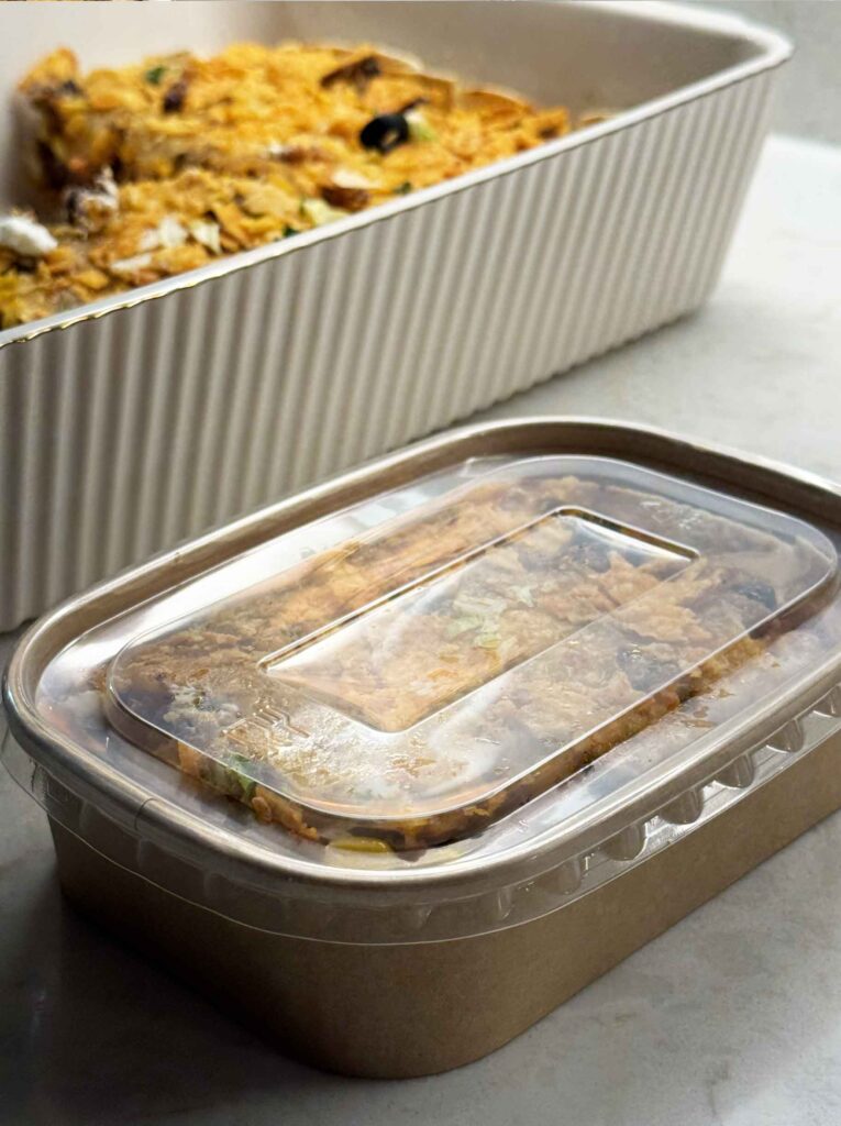 A tightly covered small container with leftovers
