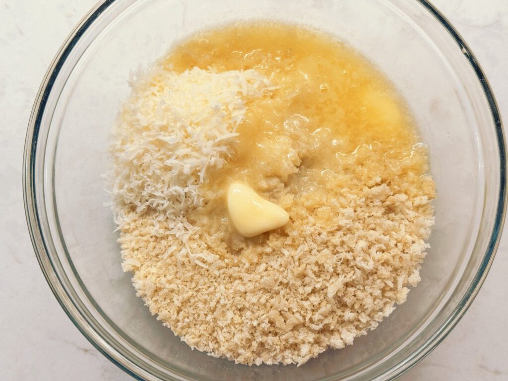 Mixing the panko, Parmesan, and butter