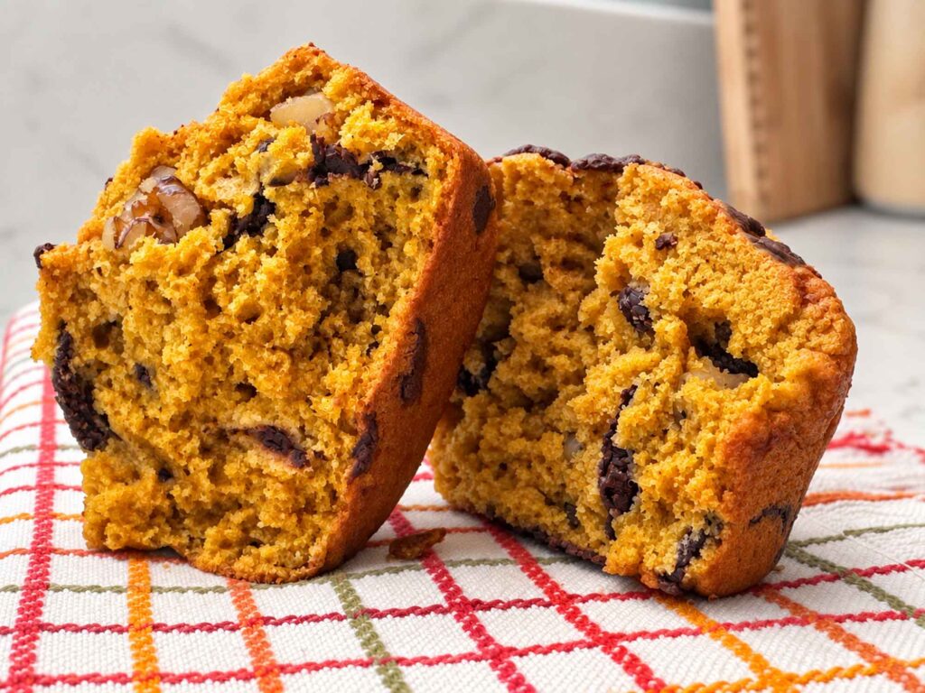 Inside of a pumpkin chocolate chip muffin showing the crumb